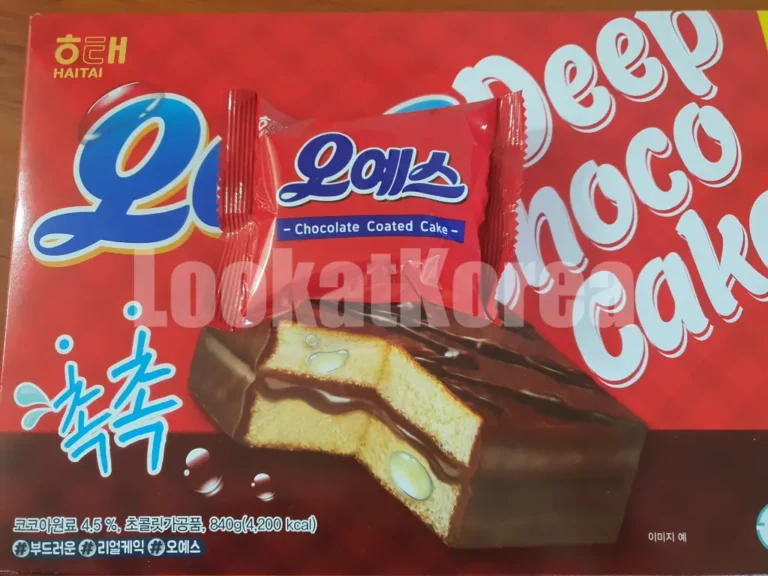 A red box of Haitai Oh Yes Deep Choco Cake with an individually wrapped snack package on top. A popular chocolate dessert in Korea.