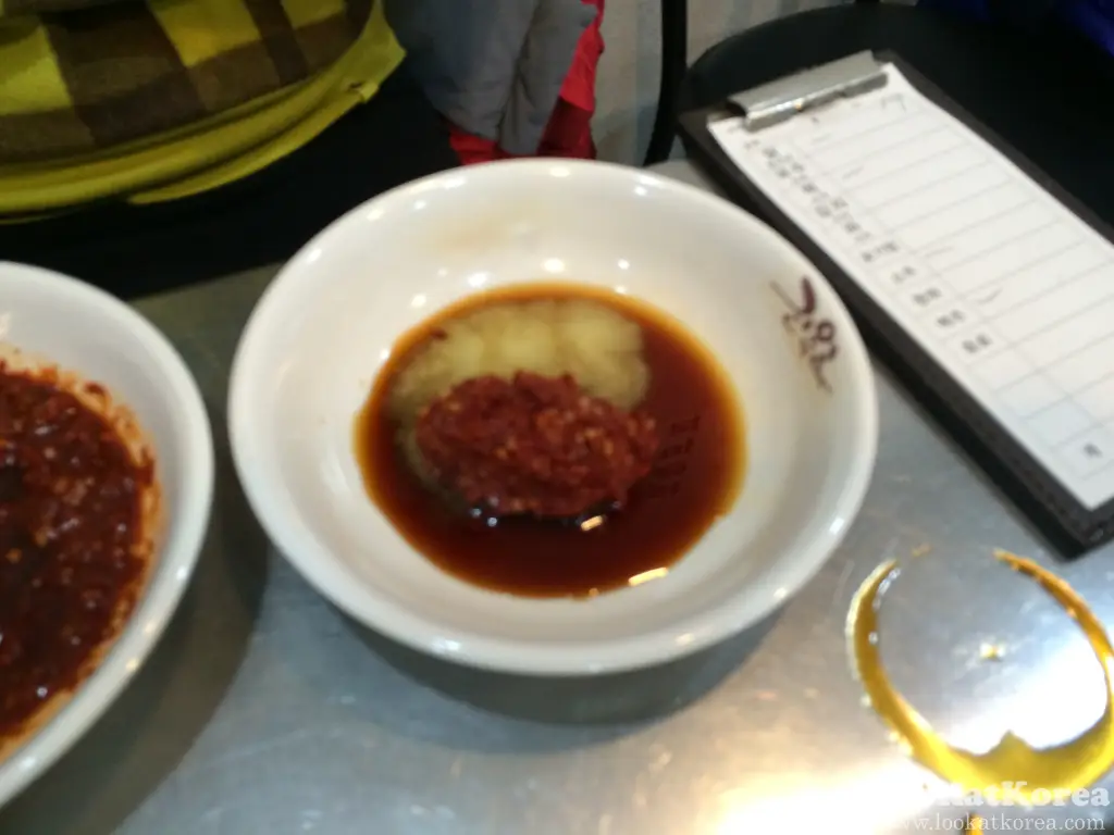 Homemade-style dipping sauce made with Korean chili paste, soy sauce, and minced garlic for Dakhanmari