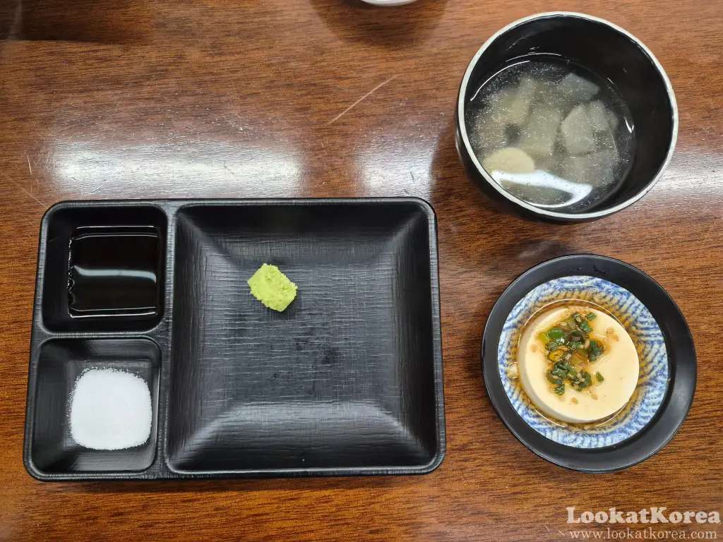 Salt, wasabi, sesame oil dip and beef radish soup served with Hanwoo